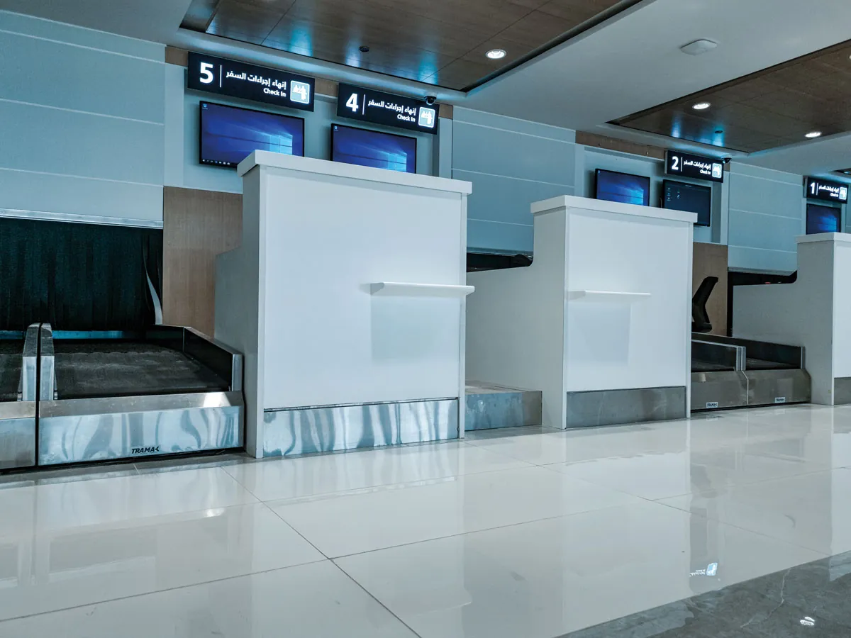 Check-in counters with BELTCON weighing and dispatcher conveyors