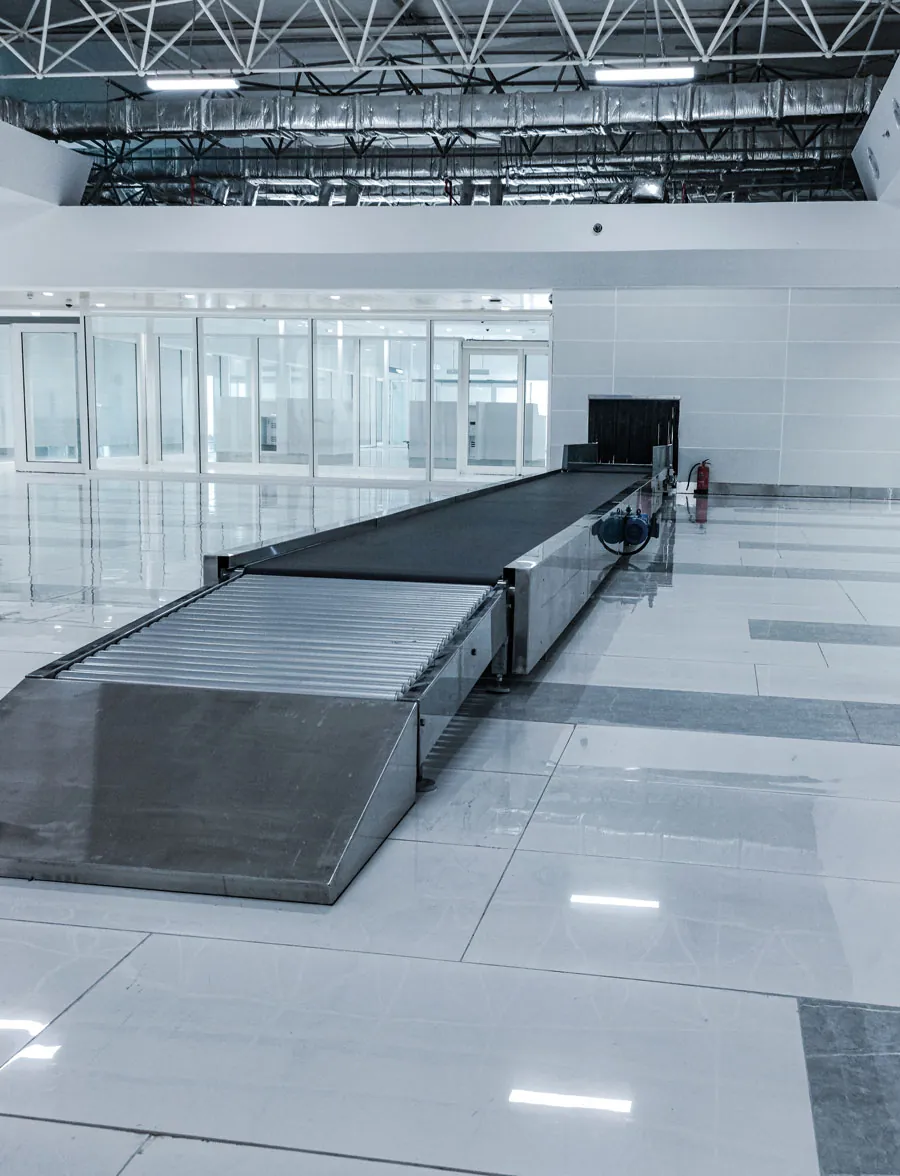 A BELTCON straight belt conveyor installed in a terminal hall